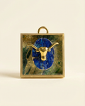 Decorative art with a gold bull head on a blue lapis  on acrylic frame 