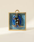 Decorative vintage kangaroo brooch on a blue glittery acrylic frame 
