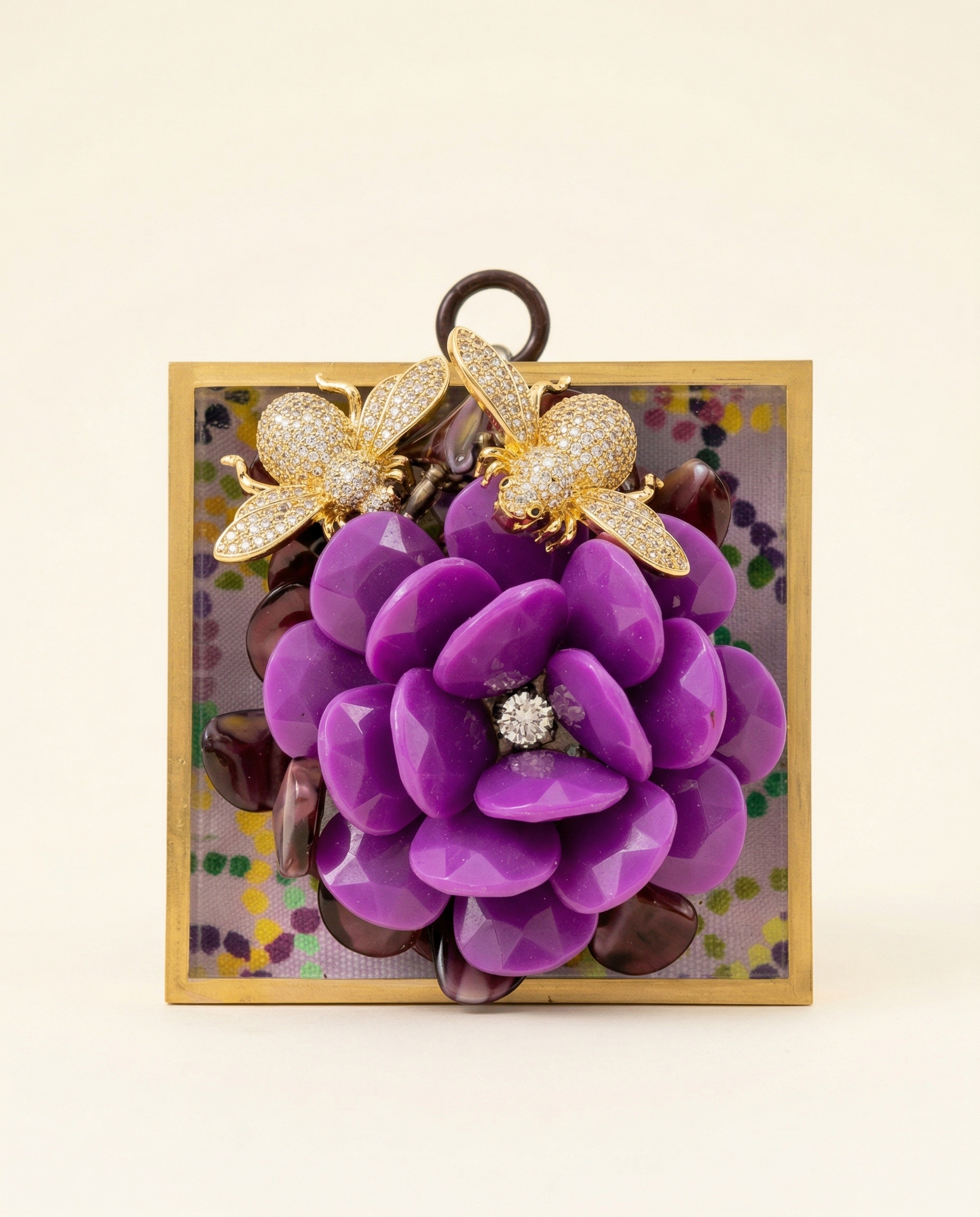 Decorative item with purple flower and gold sparkle bee ls on a colorful acrylic background art 