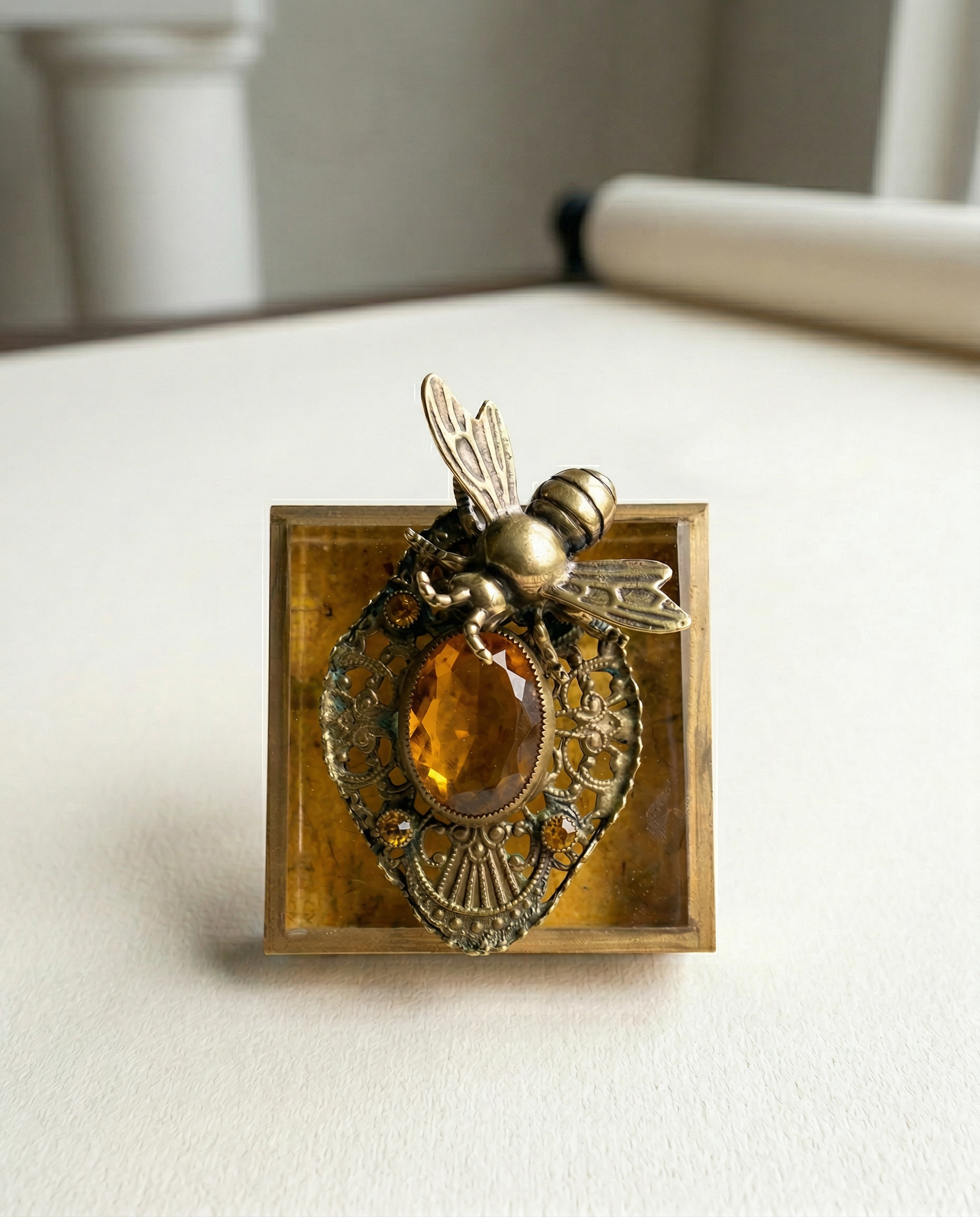 Decorative wall art with a bee on a vintage brooch art 