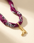purple scarf necklace with cowboy boot charm