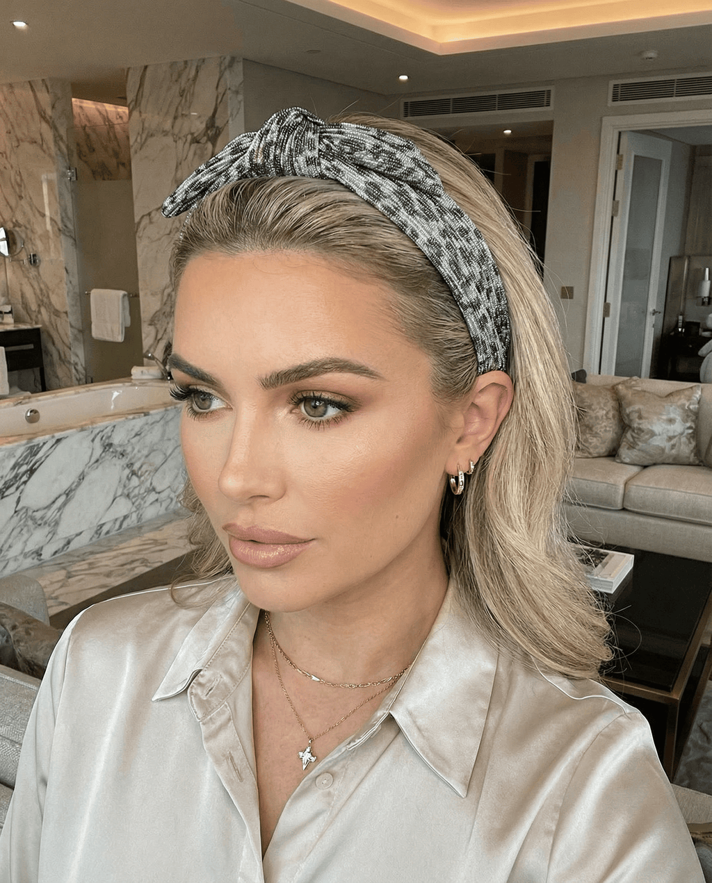 Woman with a headband in a modern living room