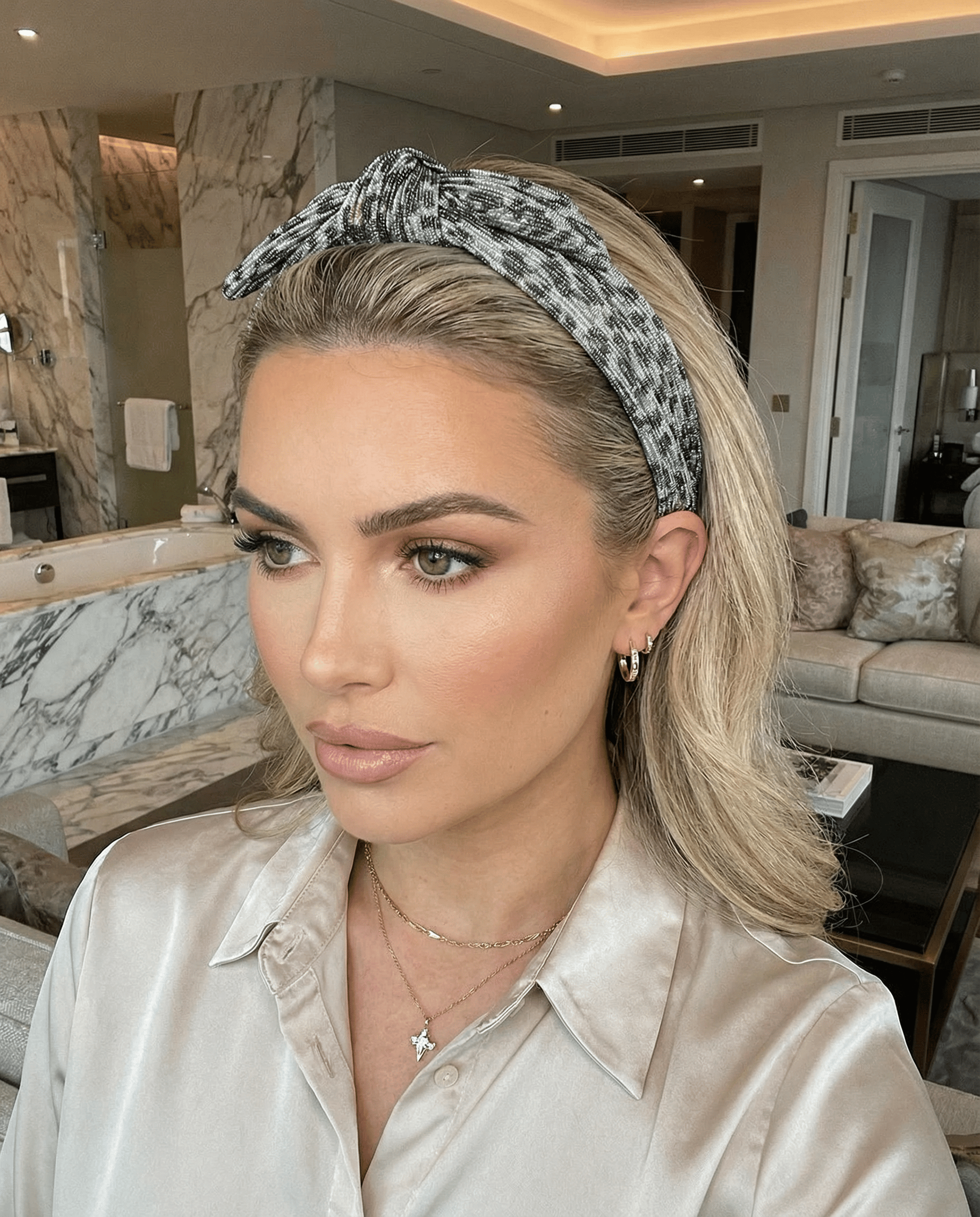 Woman with a headband in a modern living room
