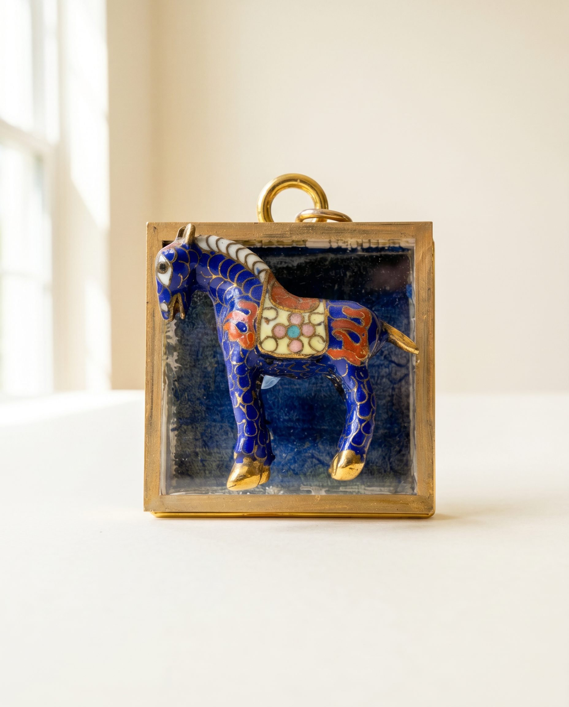 Decorative cloisonné horse pendant on a green frame art