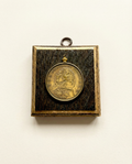 Gold coin on a wooden bourbon barrel frame art

