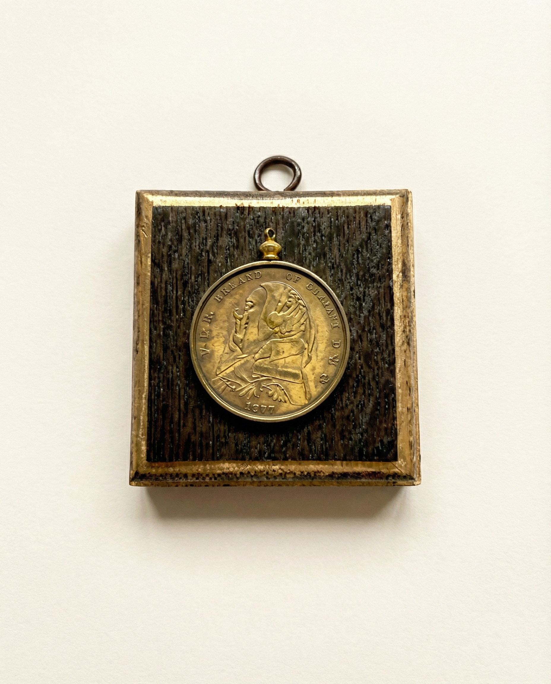 Gold coin on a wooden bourbon barrel frame art
