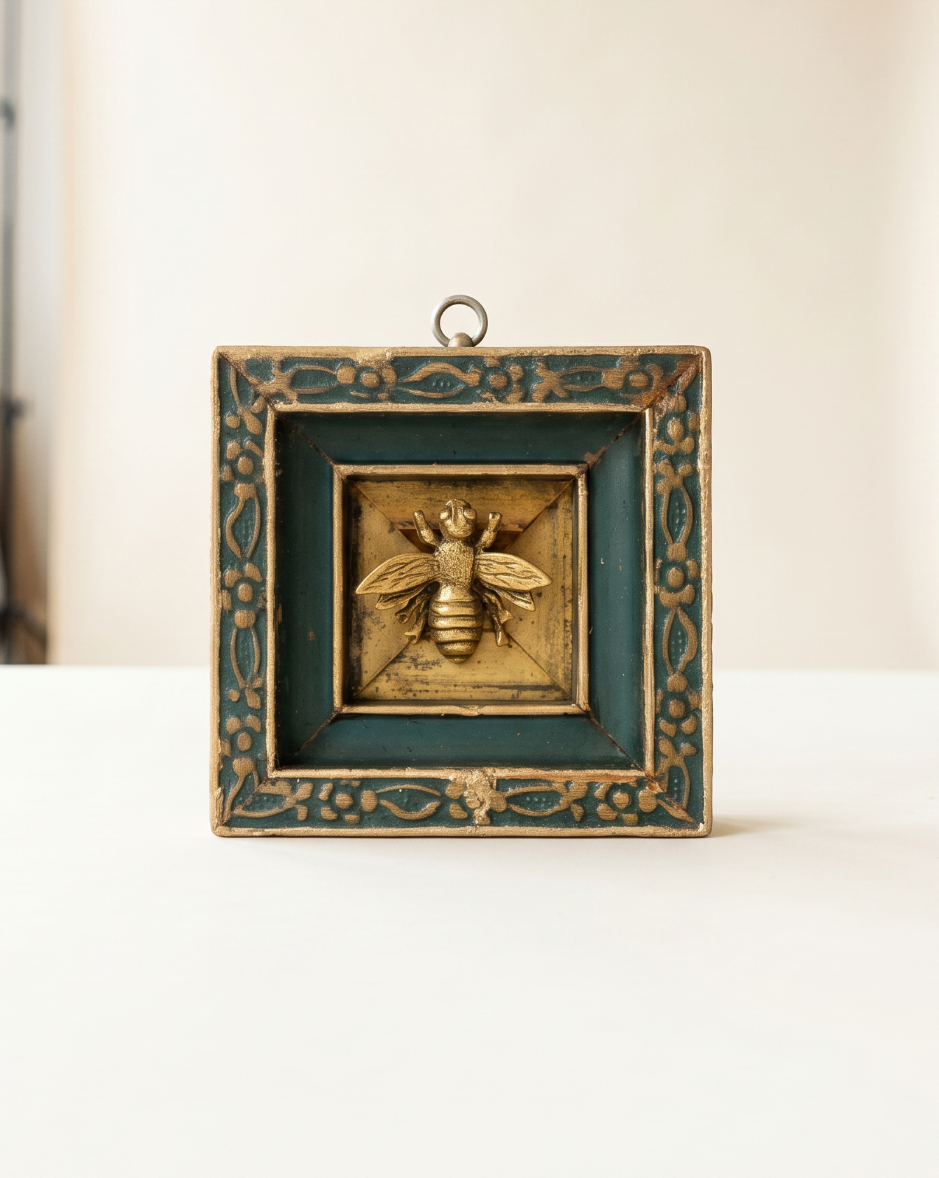 Decorative wall art with a bee design on a green painted wooden frame art 