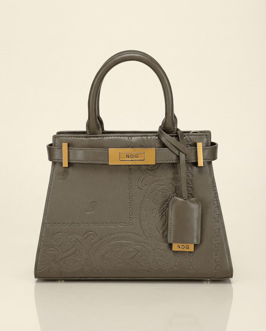 Olive Green handbag with gold accents on a beige background