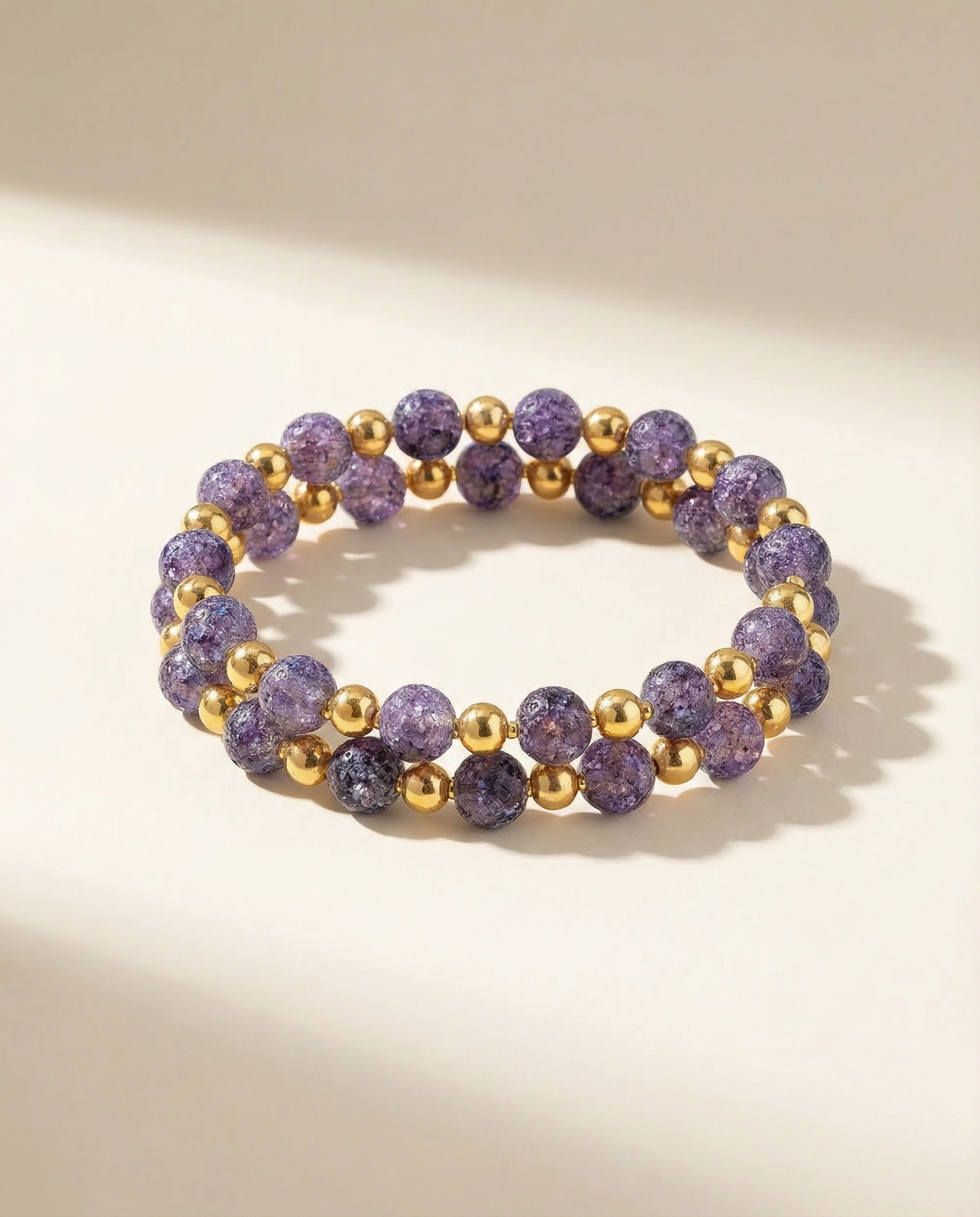 purple and gold beaded bracelet